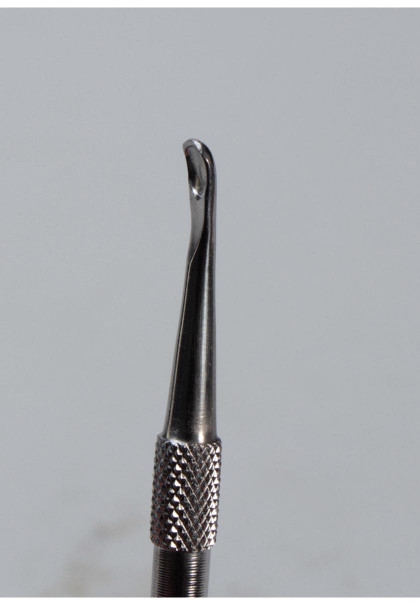 Werkzeug mti Schaber und Löffel Detail